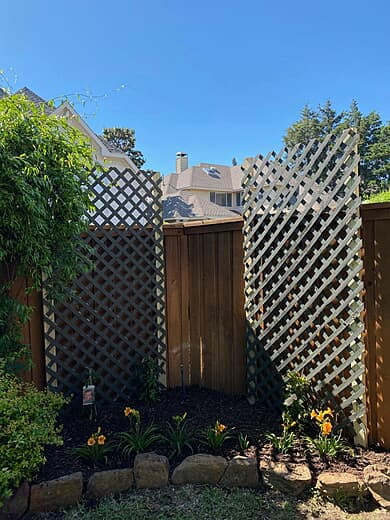 Beautiful Backyard Privacy Fence with Lattice Panels