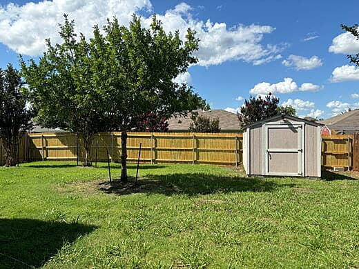 Backyard with Shed and New Fence