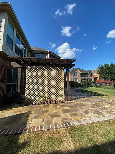 Spacious Backyard Patio with Pergola